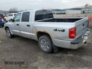 ✅ 2005 Dodge Dakota SLT • VIN: 1D7HW48N75S292255 • Лот: 80596074. Размещён на Copart с пробегом 255 776 миль миль. Получите бесплатный доступ к архиву аукционных продаж из США и посмотрите подробный отчёт об истории автомобиля на DreamBid. Изображение 2.