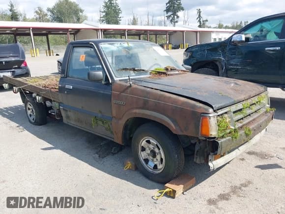 ✅ 1986 Mazda B-Series • VIN: JM2UF2113G0524509 • Lot: 42782383. Wystawiony na IAAI z przebiegiem 313 108 mil. Bezpłatny archiwum sprzedaży aukcyjnych z USA i szczegółowy raport historii pojazdu na DreamBid. Zdjęcie 1.