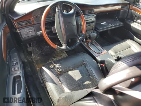 ✅ 2002 Cadillac Eldorado Touring • VIN: 1G6ET12912B102383 • Лот: 75119604. Опубликован ранее на Copart с пробегом Не указан. Бесплатный доступ к архиву аукционных продаж из США и подробный отчёт об истории автомобиля на DreamBid. Изображение 8.