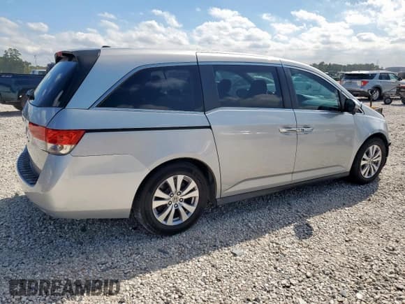 ✅ 2014 Honda Odyssey EX-L • VIN: 5FNRL5H64EB012097 • Lot: 90753135. Listed on Copart with 159,252 mi. Free auction sales archive from the USA and detailed vehicle history report at DreamBid. Image 3.
