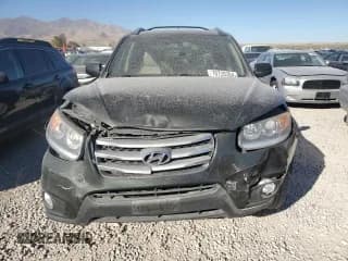 ✅ 2012 Hyundai Santa Fe Limited • VIN: 5XYZKDAG3CG110463 • Lot: 70720384. Listed on Copart with 123,928 mi. Free auction sales archive from the USA and detailed vehicle history report at DreamBid. Image 5.