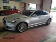 ✅ 2016 Audi A6 Premium • VIN: WAUFFAFC1GN124742 • Lot: 68173615. Listed on Copart with 115,675 mi. Free auction sales archive from the USA and detailed vehicle history report at DreamBid. Image 1.