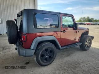 ✅ 2010 Jeep Wrangler Sport • VIN: 1J4AA2D16AL216879 • Лот: 81922965. Опубликован ранее на Copart с пробегом 116 723 миль. Бесплатный доступ к архиву аукционных продаж из США и подробный отчёт об истории автомобиля на DreamBid. Изображение 3.