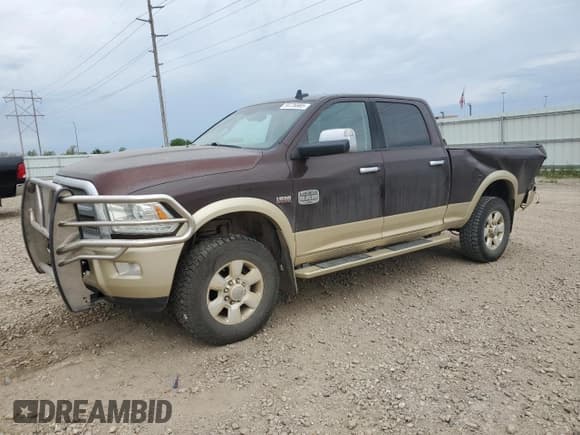 ✅ 2015 Ram 2500 Longhorn • VIN: 3C6UR5GJ0FG574127 • Lot: 59736985. Wystawiony na Copart z przebiegiem 153 969 mil. Bezpłatny archiwum sprzedaży aukcyjnych z USA i szczegółowy raport historii pojazdu na DreamBid. Zdjęcie 1.
