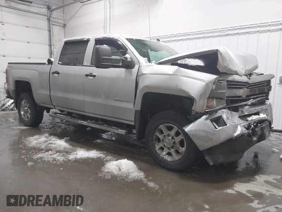 ✅ 2015 Chevrolet Silverado 2500HD LT • VIN: 1GC1KVEG0FF128133 • Lot: 43741035. Listed on IAAI with 47,650 mi. Free auction sales archive from the USA and detailed vehicle history report at DreamBid. Image 1.