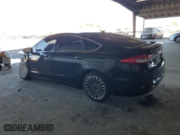 ✅ 2018 Ford Fusion Titanium • VIN: 3FA6P0RU2JR101379 • Lot: 87423645. Listed on Copart with Not provided. Free auction sales archive from the USA and detailed vehicle history report at DreamBid. Image 2.