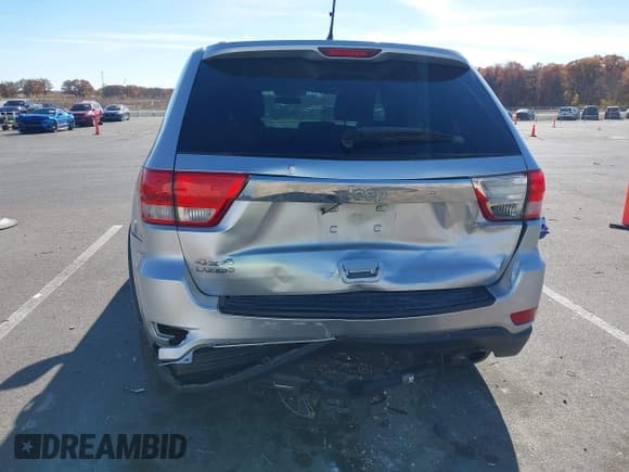 ✅ 2013 Jeep Grand Cherokee Laredo • VIN: 1C4RJFAG8DC607593 • Lot: 43643452. Listed on IAAI with 168,356 mi. Free auction sales archive from the USA and detailed vehicle history report at DreamBid. Image 6.