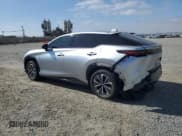 ✅ 2023 Lexus RZ 450e Premium • VIN: JTJAAAAB6PA019869 • Lot: 66414495. Listed on Copart with 14,149 mi. Free auction sales archive from the USA and detailed vehicle history report at DreamBid. Image 2.