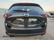 ✅ 2021 Mazda CX-5 Touring • VIN: JM3KFBCM4M0484768 • Lot: 91646205. Wystawiony na Copart z przebiegiem 48 114 mil. Bezpłatny archiwum sprzedaży aukcyjnych z USA i szczegółowy raport historii pojazdu na DreamBid. Zdjęcie 6.