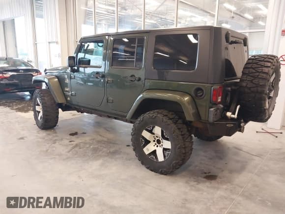✅ 2008 Jeep Wrangler Unlimited Sahara • VIN: 1J4GA59158L504309 • Lot: 43292936. Listed on IAAI with 147,545 mi. Free auction sales archive from the USA and detailed vehicle history report at DreamBid. Image 3.