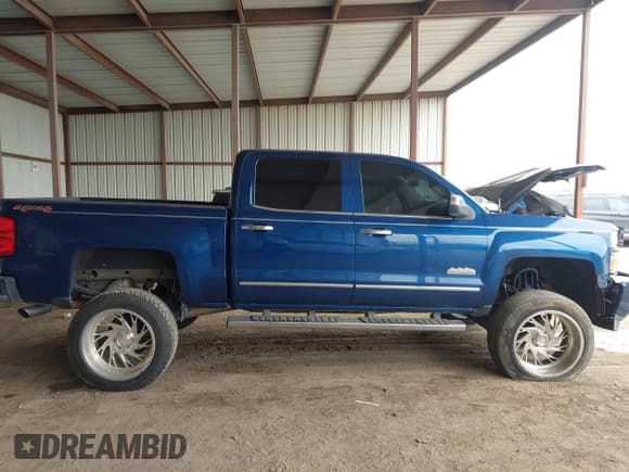 ✅ 2015 Chevrolet Silverado 1500 High Country • VIN: 3GCUKTEJ0FG491799 • Лот: 41615824. Опубликован ранее на IAAI с пробегом 118 745 миль. Бесплатный доступ к архиву аукционных продаж из США и подробный отчёт об истории автомобиля на DreamBid. Изображение 13.