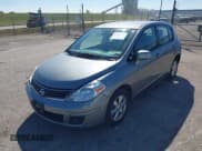 ✅ 2012 Nissan Versa S • VIN: 3N1BC1CP9CK801573 • Lot: 43251441. Listed on IAAI with 136,411 mi. Free auction sales archive from the USA and detailed vehicle history report at DreamBid. Image 2.
