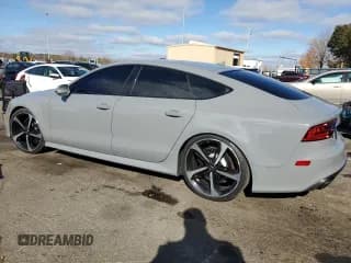 ✅ 2014 Audi RS 7 Prestige • VIN: WUAW2AFC6EN902998 • Lot: 79103904. Wystawiony na Copart z przebiegiem 70 342 mil. Bezpłatny archiwum sprzedaży aukcyjnych z USA i szczegółowy raport historii pojazdu na DreamBid. Zdjęcie 2.