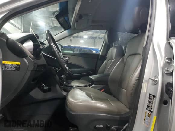 2014 Hyundai Santa Fe z VIN 5XYZW3LA4EG205141, wystawiony jako Copart lot #65400145 z przebiegiem 135 224 mil mil oraz Szkoda całkowita • Salvage title. Historia ofert i sprzedaży dostępna na DreamBid. Obrazek 7.