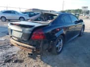 ✅ 2004 Pontiac Grand Prix GTP • VIN: 2G2WR544541375214 • Lot: 42640307. Wystawiony na IAAI z przebiegiem 190 432 mil. Bezpłatny archiwum sprzedaży aukcyjnych z USA i szczegółowy raport historii pojazdu na DreamBid. Zdjęcie 4.