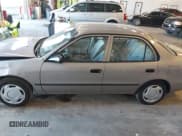 ✅ 1999 Toyota Corolla LE • VIN: 2T1BR12EXXC198079 • Лот: 43469173. Опубликован ранее на IAAI с пробегом 84 359 миль. Бесплатный доступ к архиву аукционных продаж из США и подробный отчёт об истории автомобиля на DreamBid. Изображение 14.