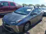 2022 Toyota Prius LE with VIN JTDL9MFU2N3034161, listed as a IAAI auction lot 40359290 with 62,451 mi miles and . Bid and sale history available at DreamBid. Image 2.