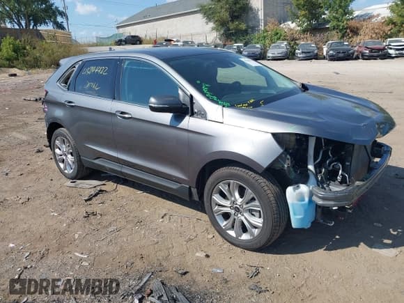 ✅ 2023 Ford Edge Titanium • VIN: 2FMPK4K96PBA26800 • Лот: 43244422. Опубликован ранее на IAAI с пробегом 63 417 миль. Бесплатный доступ к архиву аукционных продаж из США и подробный отчёт об истории автомобиля на DreamBid. Изображение 1.