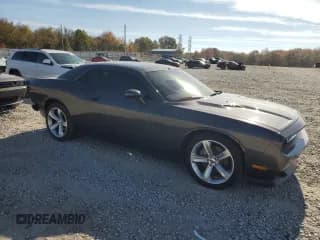 ✅ 2013 Dodge Challenger SXT • VIN: 2C3CDYAG7DH651935 • Lot: 82237274. Wystawiony na Copart z przebiegiem 117 361 mil. Bezpłatny archiwum sprzedaży aukcyjnych z USA i szczegółowy raport historii pojazdu na DreamBid. Zdjęcie 4.
