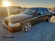 ✅ 2005 Ford Police Interceptor • VIN: 2FAFP71W85X158750 • Лот: 86134895. Опубликован ранее на Copart с пробегом 97 171 миль. Бесплатный доступ к архиву аукционных продаж из США и подробный отчёт об истории автомобиля на DreamBid. Изображение 1.