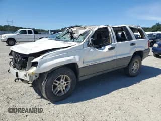 ✅ 2002 Jeep Grand Cherokee Laredo • VIN: 1J4GW48N92C129158 • Lot: 55665055. Listed on Copart with Not provided. Free auction sales archive from the USA and detailed vehicle history report at DreamBid. Image 1.