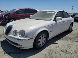 ✅ 2003 Jaguar S-Type • VIN: SAJEA01T53FM75786 • Лот: 62191844. Опубликован ранее на Copart с пробегом 123 525 миль. Бесплатный доступ к архиву аукционных продаж из США и подробный отчёт об истории автомобиля на DreamBid. Изображение 1.