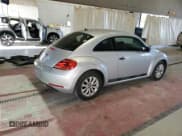 ✅ 2014 Volkswagen Beetle Entry • VIN: 3VWF17AT7EM659056 • Lot: 81663565. Wystawiony na Copart z przebiegiem 129 208 mil. Bezpłatny archiwum sprzedaży aukcyjnych z USA i szczegółowy raport historii pojazdu na DreamBid. Zdjęcie 3.