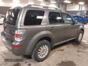 ✅ 2010 Mercury Mariner Premier • VIN: 4M2CN9HGXAKJ28184 • Lot: 42480802. Wystawiony na IAAI z przebiegiem 145 645 mil. Bezpłatny archiwum sprzedaży aukcyjnych z USA i szczegółowy raport historii pojazdu na DreamBid. Zdjęcie 4.
