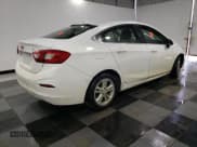 ✅ 2018 Chevrolet Cruze LT • VIN: 1G1BE5SM0J7115240 • Lot: 85850895. Listed on Copart with 143,645 mi. Free auction sales archive from the USA and detailed vehicle history report at DreamBid. Image 3.