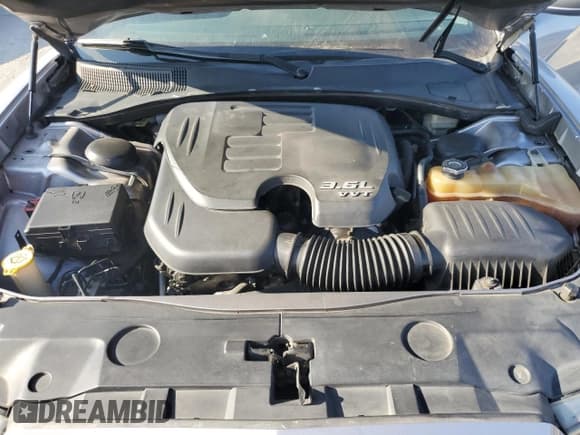 ✅ 2014 Dodge Charger SE • VIN: 2C3CDXBG8EH221521 • Lot: 92023065. Wystawiony na Copart z przebiegiem 202 813 mil. Bezpłatny archiwum sprzedaży aukcyjnych z USA i szczegółowy raport historii pojazdu na DreamBid. Zdjęcie 11.