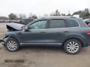 ✅ 2012 Volkswagen Touareg Sport • VIN: WVGEF9BP5CD011717 • Lot: 41787614. Wystawiony na IAAI z przebiegiem 138 127 mil. Bezpłatny archiwum sprzedaży aukcyjnych z USA i szczegółowy raport historii pojazdu na DreamBid. Zdjęcie 14.