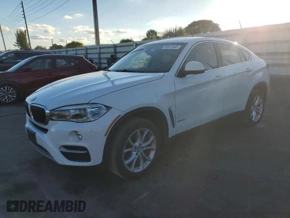 ✅ 2015 BMW X6 xDrive35i • VIN: 5UXKU2C54F0F95994 • Lot: 93351645. Listed on Copart with 164,540 mi. Free auction sales archive from the USA and detailed vehicle history report at DreamBid. Image 1.