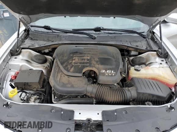 2022 Dodge Charger SXT with VIN 2C3CDXBG0NH197084, listed as a Copart auction lot 71043965 with 89,187 mi miles and Salvage title. Bid and sale history available at DreamBid. Image 11.