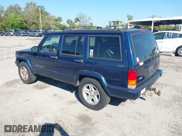 ✅ 2001 Jeep Cherokee Sport • VIN: 1J4FF58S21L612724 • Lot: 41668763. Listed on IAAI with 122,464 mi. Free auction sales archive from the USA and detailed vehicle history report at DreamBid. Image 3.