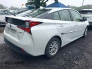 ✅ 2022 Toyota Prius L Eco • VIN: JTDKAMFU2N3167148 • Lot: 42534666. Listed on IAAI with 92,890 mi. Free auction sales archive from the USA and detailed vehicle history report at DreamBid. Image 4.