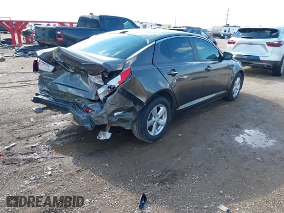✅ 2014 Kia Optima LX • VIN: 5XXGM4A7XEG284037 • Lot: 43225986. Listed on IAAI with 115,054 mi. Free auction sales archive from the USA and detailed vehicle history report at DreamBid. Image 4.
