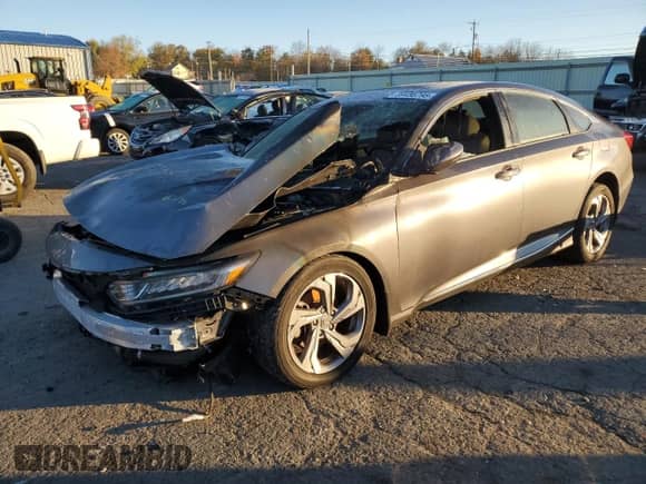 2018 Honda Accord EX-L z VIN 1HGCV1F5XJA140710, wystawiony jako Copart lot #89456795 z przebiegiem Nie podano mil oraz Szkoda całkowita • Salvage title. Historia ofert i sprzedaży dostępna na DreamBid. Obrazek 1.