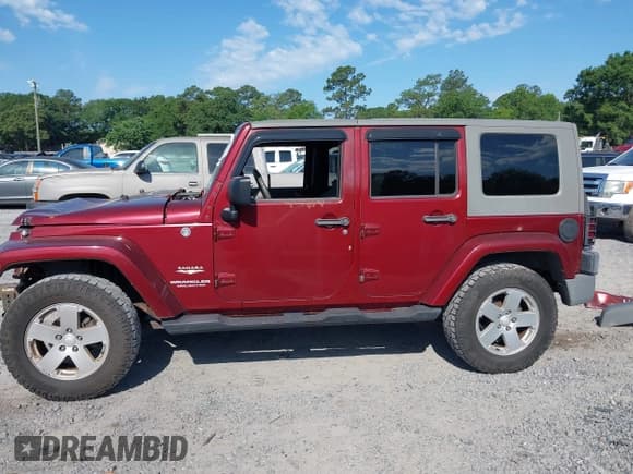 ✅ 2007 Jeep Wrangler Unlimited Sahara • VIN: 1J8GA59187L211825 • Lot: 42313099. Listed on IAAI with 107,554 mi. Free auction sales archive from the USA and detailed vehicle history report at DreamBid. Image 15.