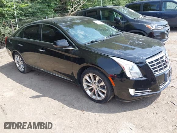 ✅ 2015 Cadillac XTS Luxury • VIN: 2G61N5S36F9125192 • Lot: 42673741. Wystawiony na IAAI z przebiegiem 122 614 mil. Bezpłatny archiwum sprzedaży aukcyjnych z USA i szczegółowy raport historii pojazdu na DreamBid. Zdjęcie 1.