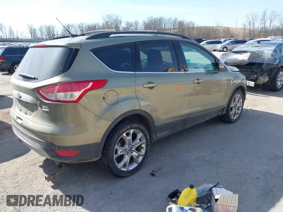 ✅ 2013 Ford Escape SEL • VIN: 1FMCU9HX4DUC34174 • Lot: 41781517. Listed on IAAI with Not provided. Free auction sales archive from the USA and detailed vehicle history report at DreamBid. Image 4.