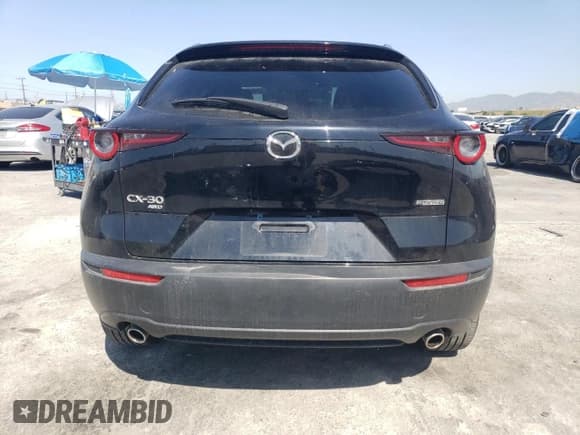✅ 2023 Mazda CX-30 S Preferred • VIN: 3MVDMBCMXPM550988 • Lot: 48462525. Listed on Copart with 20,317 mi. Free auction sales archive from the USA and detailed vehicle history report at DreamBid. Image 6.