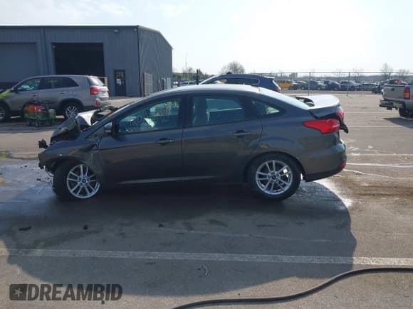 ✅ 2016 Ford Focus SE • VIN: 1FADP3F22GL350882 • Lot: 42063689. Listed on IAAI with 37,764 mi. Free auction sales archive from the USA and detailed vehicle history report at DreamBid. Image 15.