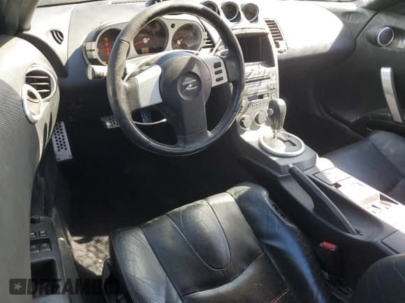 ✅ 2003 Nissan 350Z Touring • VIN: JN1AZ34E33T003854 • Lot: 91956575. Wystawiony na Copart z przebiegiem 91 238 mil. Bezpłatny archiwum sprzedaży aukcyjnych z USA i szczegółowy raport historii pojazdu na DreamBid. Zdjęcie 8.