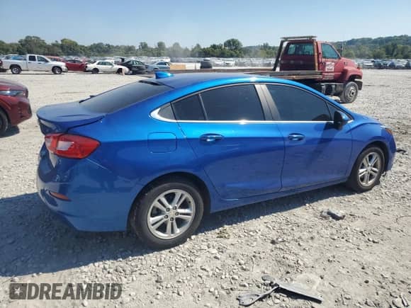 2018 Chevrolet Cruze LT z VIN 1G1BE5SM3J7247196, wystawiony jako Copart lot #71888795 z przebiegiem 88 509 mil mil oraz Szkoda całkowita • Salvage title. Historia ofert i sprzedaży dostępna na DreamBid. Obrazek 3.