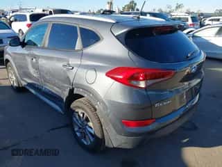 2017 Hyundai Tucson SE z VIN KM8J33A49HU421293, wystawiony jako IAAI lot #43470850 z przebiegiem 57 198 mil mil oraz . Historia ofert i sprzedaży dostępna na DreamBid. Obrazek 3.