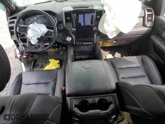 2021 Ram 1500 Rebel z VIN 1C6SRFLT1MN529318, wystawiony jako Copart lot #67312665 z przebiegiem Nie podano mil oraz Szkoda całkowita • Salvage title. Historia ofert i sprzedaży dostępna na DreamBid. Obrazek 8.