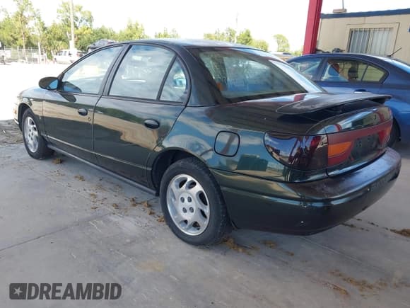 ✅ 2000 Saturn SL • VIN: 1G8ZK5276YZ217966 • Lot: 43310131. Wystawiony na IAAI z przebiegiem 69 028 mil. Bezpłatny archiwum sprzedaży aukcyjnych z USA i szczegółowy raport historii pojazdu na DreamBid. Zdjęcie 3.