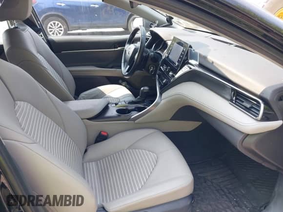 2023 Toyota Camry SE z VIN 4T1G11BKXPU101092, wystawiony jako IAAI lot #42396141 z przebiegiem 22 174 mil mil oraz . Historia ofert i sprzedaży dostępna na DreamBid. Obrazek 5.