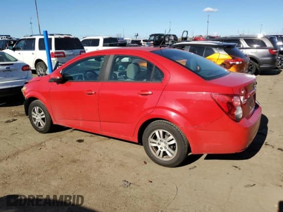 ✅ 2012 Chevrolet Sonic LS • VIN: 1G1JB5SH2C4197743 • Lot: 86045454. Listed on Copart with 156,723 mi. Free auction sales archive from the USA and detailed vehicle history report at DreamBid. Image 2.