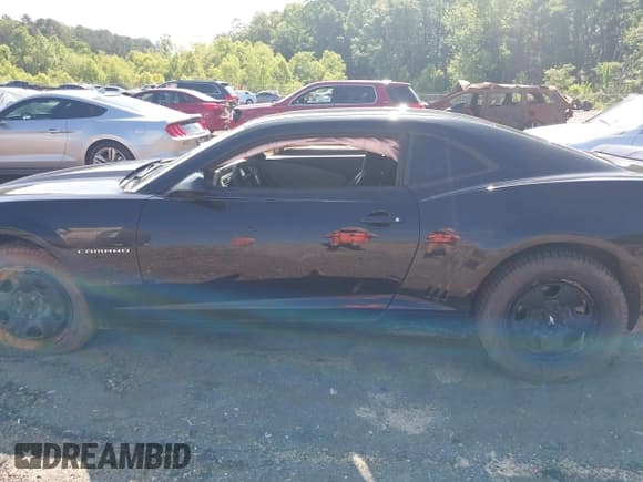 ✅ 2012 Chevrolet Camaro 1LS • VIN: 2G1FE1E36C9167843 • Lot: 42220203. Listed on IAAI with 119,426 mi. Free auction sales archive from the USA and detailed vehicle history report at DreamBid. Image 14.